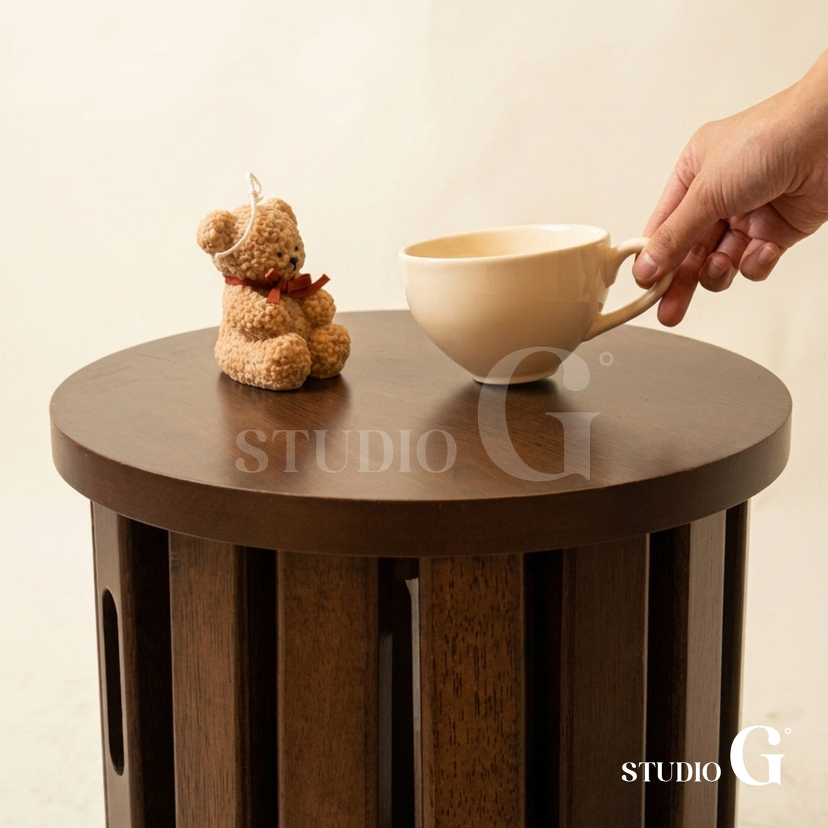 Dark Brown tabletop with a coffee cup and a small teddy bear